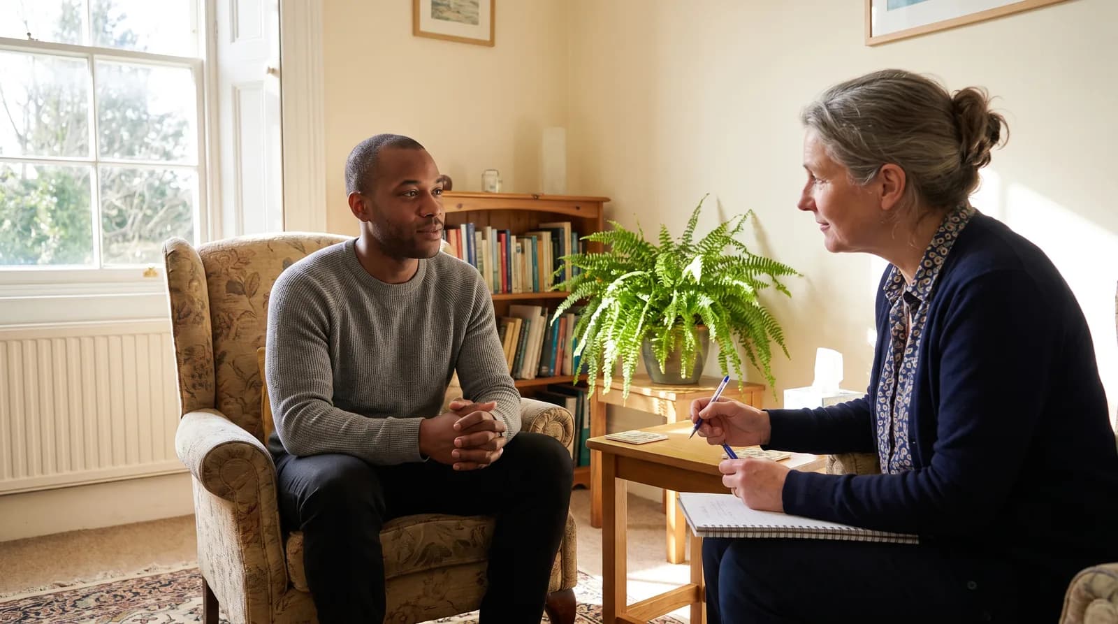Independent psychiatrist listening during a psychiatric assessment arranged for an immigration matter